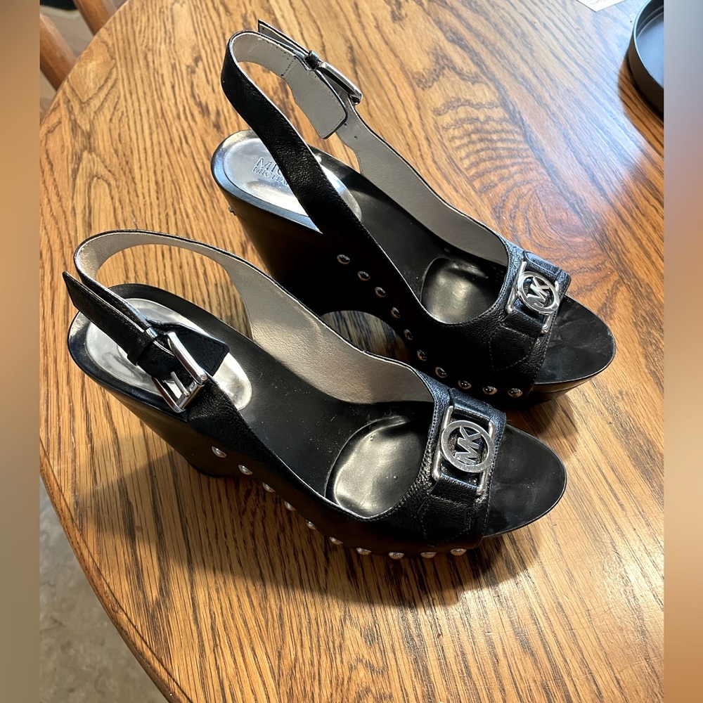 Michael Kors black with silver studs, worn very little.